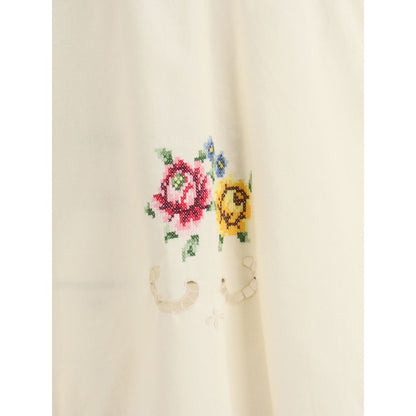 Blouse with floral details